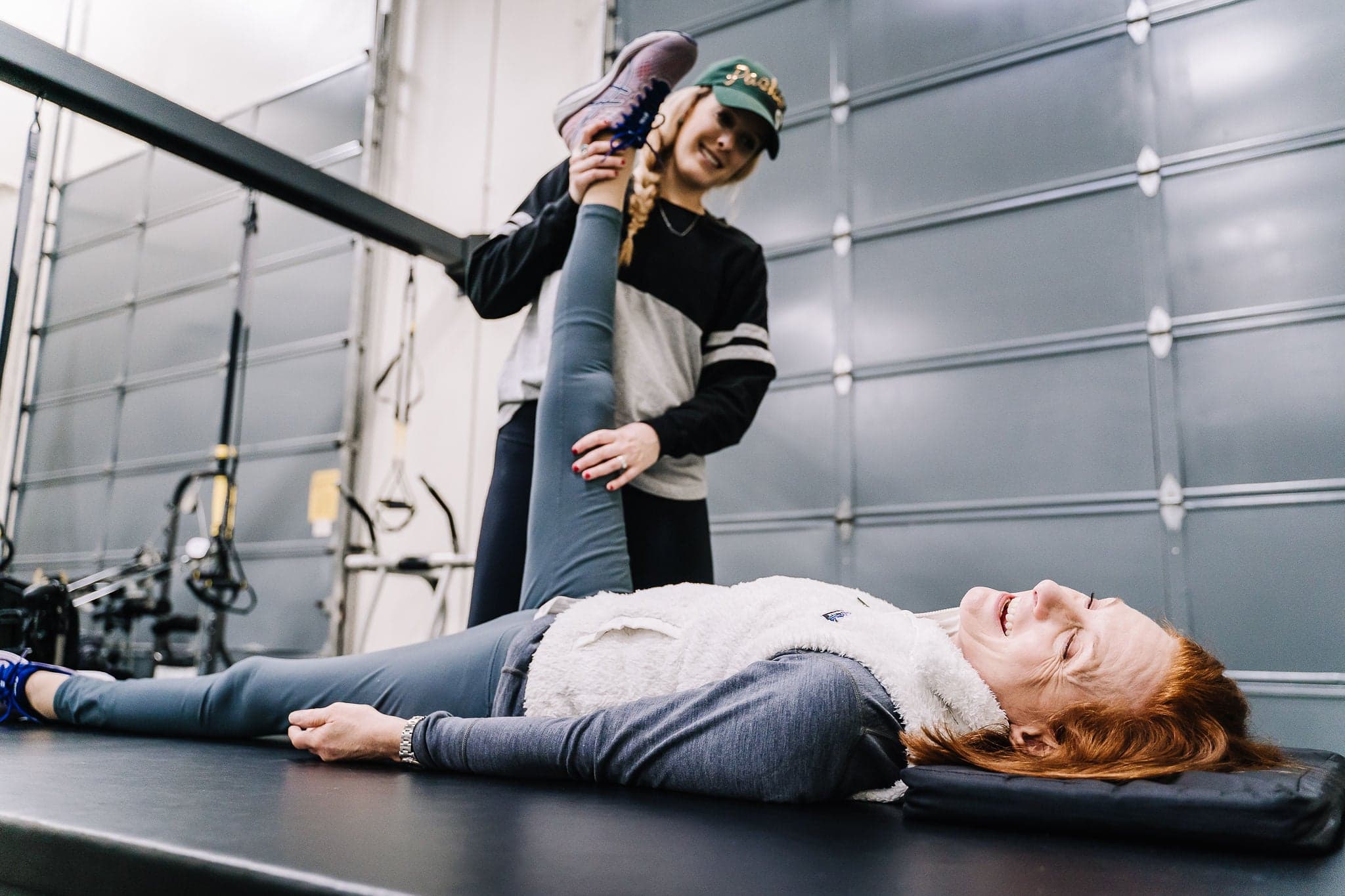 Hamstring stretch and table-based mobility work with an ADAPT specialist