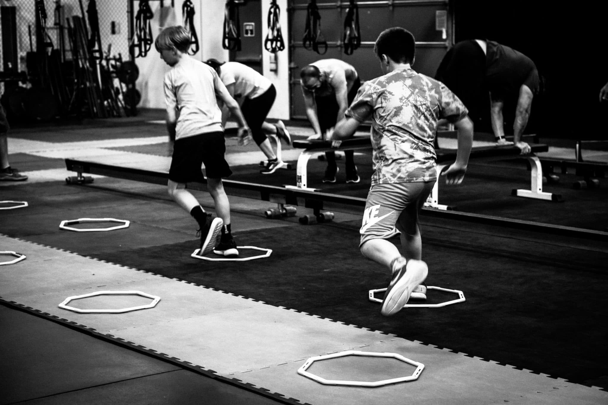 Youth athletes training agility across multiple stations: sport-specific drill work